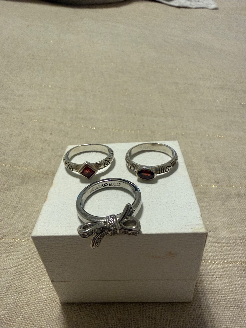 Silver Bow Accent Ring with Garnet-Colored Stones - Unbranded